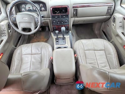 Zdjęcie 8 z 14 samochodu: 2001 JEEP GRAND CHEROKEE LIMITED VIN:1J4GW58N71C612734 - miniatura