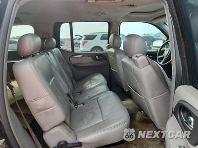 Zdjęcie 11 z 14 samochodu: 2006 GMC ENVOY DENALI XL VIN:1GKES66M766143972 - miniatura
