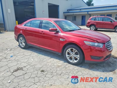 Czwarte zdjęcie samochodu z boku: 2015 FORD TAURUS SEL VIN:1FAHP2H89FG188317 - miniatura