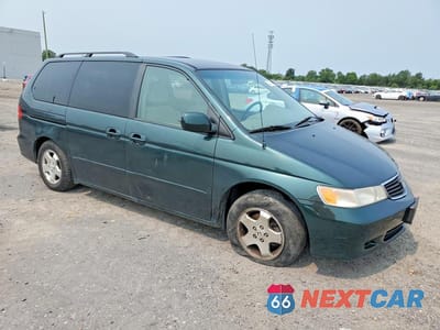 Czwarte zdjęcie samochodu z boku: 2000 HONDA ODYSSEY EX VIN:2HKRL1865YH588246 - miniatura