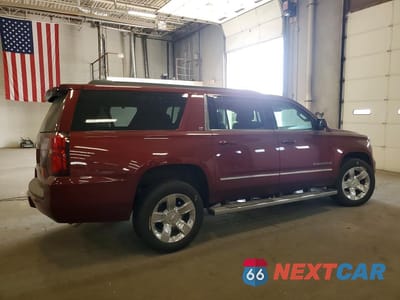 Trzecie zdjęcie samochodu z tyłu: 2019 CHEVROLET SUBURBAN K1500 LT VIN:1GNSKHKC3KR297327 - miniatura