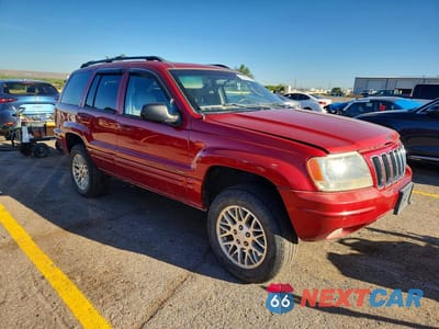 Czwarte zdjęcie samochodu z boku: 2002 JEEP GRAND CHEROKEE LIMITED VIN:1J8GW58NX2C257879 - miniatura