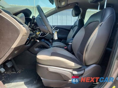 Zdjęcie 7 z 13 samochodu: 2011 HYUNDAI TUCSON GLS VIN:KM8JU3AC6BU261837 - miniatura