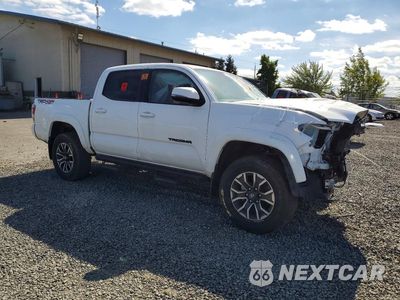 Czwarte zdjęcie samochodu z boku: 2023 TOYOTA TACOMA TRD SPORT VIN:3TMCZ5AN1PM643362 - miniatura