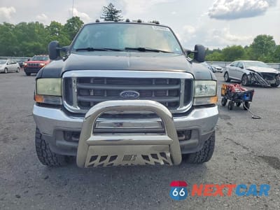 Piąte zdjęcie samochodu w środku: 2004 FORD F350 SRW SUPER DUTY VIN:1FTSF31P34EA15007 - miniatura
