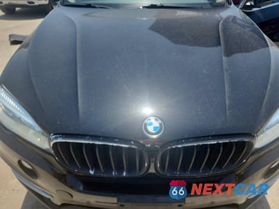 Zdjęcie 12 z 13 samochodu: 2014 BMW X5 SDRIVE35I VIN:5UXKR2C50E0C01634 - miniatura