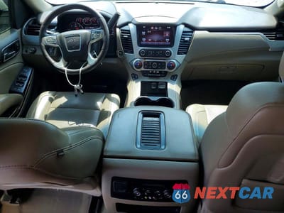Zdjęcie 8 z 13 samochodu: 2015 GMC YUKON XL C1500 SLT VIN:1GKS1HKC4FR676911 - miniatura