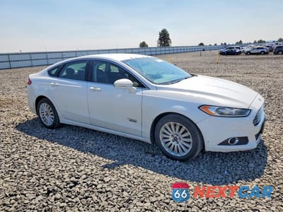 Czwarte zdjęcie samochodu z boku: 2014 FORD FUSION SE PHEV VIN:3FA6P0PU8ER248072 - miniatura