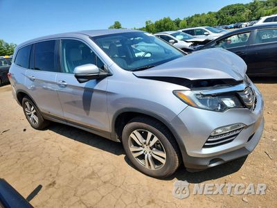 Czwarte zdjęcie samochodu z boku: 2018 HONDA PILOT EXL VIN:5FNYF6H57JB036307 - miniatura