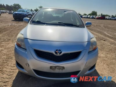 Piąte zdjęcie samochodu w środku: 2010 TOYOTA YARIS BASE VIN:JTDBT4K32A1357819 - miniatura
