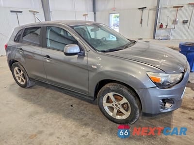 Czwarte zdjęcie samochodu z boku: 2014 MITSUBISHI OUTLANDER SPORT ES VIN:4A4AP3AU4EE023058 - miniatura