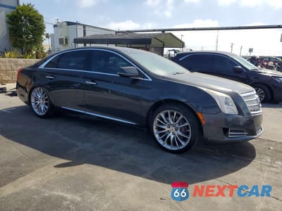Czwarte zdjęcie samochodu z boku: 2013 CADILLAC XTS PLATINUM VIN:2G61U5S3XD9102983 - miniatura