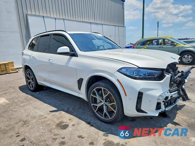 Czwarte zdjęcie samochodu z boku: 2026 BMW X5 XDRIVE50E VIN:5UX43EU02T9055922 - miniatura