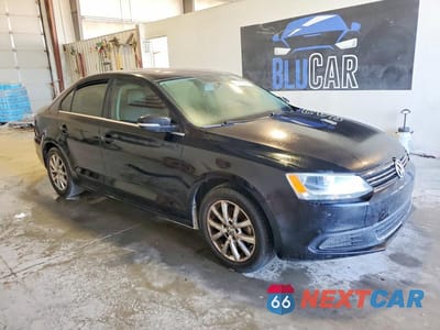 Czwarte zdjęcie samochodu z boku: 2014 VOLKSWAGEN JETTA SE VIN:3VWD17AJ9EM425927 - miniatura