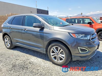 Czwarte zdjęcie samochodu z boku: 2015 FORD EDGE SEL VIN:2FMPK4J85FBC26977 - miniatura