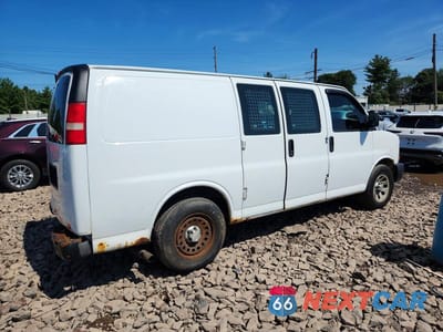 Trzecie zdjęcie samochodu z tyłu: 2014 CHEVROLET EXPRESS G1500 VIN:1GCSHAF40E1124725 - miniatura