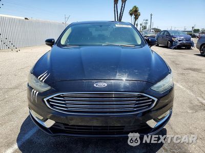 Piąte zdjęcie samochodu w środku: 2018 FORD FUSION SE HYBRID VIN:3FA6P0LU8JR247794 - miniatura
