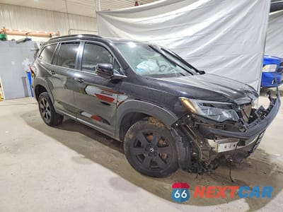 Czwarte zdjęcie samochodu z boku: 2022 HONDA PILOT TRAILSPORT VIN:5FNYF6H81NB065608 - miniatura
