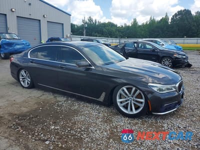Czwarte zdjęcie samochodu z boku: 2016 BMW 750 XI VIN:WBA7F2C59GG420175 - miniatura