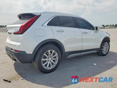 Trzecie zdjęcie samochodu z tyłu: 2019 CADILLAC XT4 PREMIUM LUXURY VIN:1GYFZDR48KF118059 - miniatura