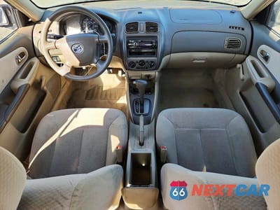 Zdjęcie 8 z 12 samochodu: 2001 MAZDA PROTEGE DX VIN:JM1BJ222010444965 - miniatura