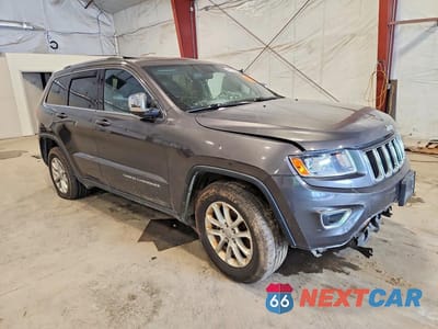 Czwarte zdjęcie samochodu z boku: 2014 JEEP GRAND CHEROKEE LAREDO VIN:1C4RJFAG9EC314920 - miniatura