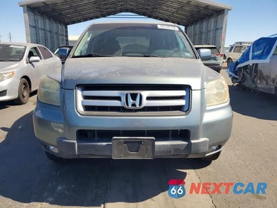 Piąte zdjęcie samochodu w środku: 2006 HONDA PILOT EX VIN:2HKYF18696H544685 - miniatura