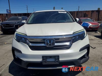 Piąte zdjęcie samochodu w środku: 2022 HONDA PILOT EXL VIN:5FNYF5H5XNB038407 - miniatura