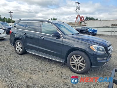 Czwarte zdjęcie samochodu z boku: 2015 MERCEDES-BENZ GL 450 4MATIC VIN:4JGDF6EEXFA586700 - miniatura