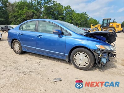 Czwarte zdjęcie samochodu z boku: 2009 HONDA CIVIC HYBRID VIN:JHMFA36259S010265 - miniatura