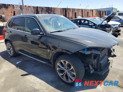 Czwarte zdjęcie samochodu z boku: 2017 BMW X5 XDR40E VIN:5UXKT0C30H0V97392 - miniatura