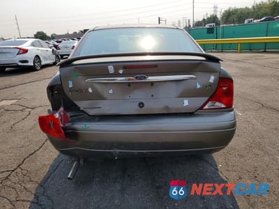 Zdjęcie 6 z 12 samochodu: 2000 FORD FOCUS SE VIN:1FAFP343XYW308478 - miniatura