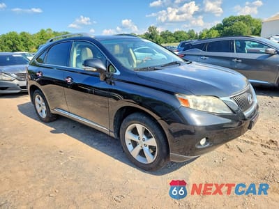 Czwarte zdjęcie samochodu z boku: 2011 LEXUS RX 350 VIN:JTJBK1BA9B2015034 - miniatura