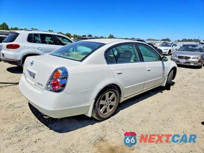 Trzecie zdjęcie samochodu z tyłu: 2003 NISSAN ALTIMA BASE/S/SL VIN:1N4AL11D93C188531 - miniatura