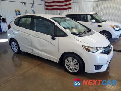 Czwarte zdjęcie samochodu z boku: 2016 HONDA FIT LX VIN:JHMGK5H59GS013834 - miniatura