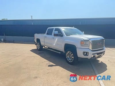 2015 GMC SIERRA K2500 DENALI 1GT120E85FF601018 - główne zdjęcie licytacji z USA - miniatura