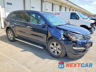 Czwarte zdjęcie samochodu z boku: 2016 CHEVROLET TRAVERSE LT VIN:1GNKRHKD6GJ259309 - miniatura
