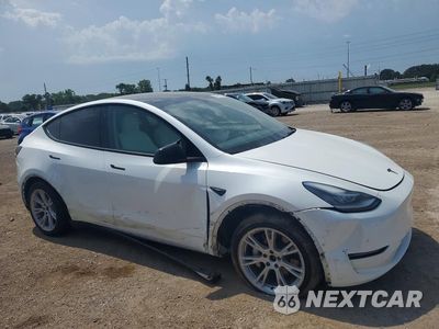 Czwarte zdjęcie samochodu z boku: 2021 TESLA MODEL Y VIN:5YJYGDEE1MF243625 - miniatura