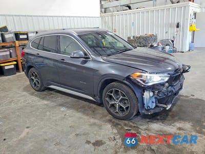 Czwarte zdjęcie samochodu z boku: 2016 BMW X1 XDRIVE28I VIN:WBXHT3C37GP880202 - miniatura