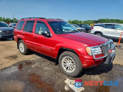 Czwarte zdjęcie samochodu z boku: 2002 JEEP GRAND CHEROKEE LIMITED VIN:1J4GW58N82C202381 - miniatura