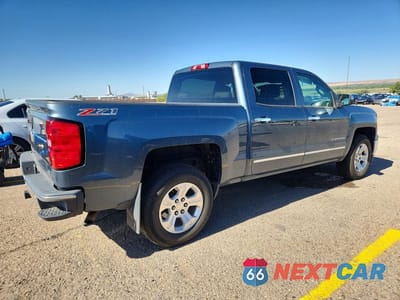 Trzecie zdjęcie samochodu z tyłu: 2014 CHEVROLET SILVERADO K1500 LTZ VIN:3GCUKSECXEG362267 - miniatura