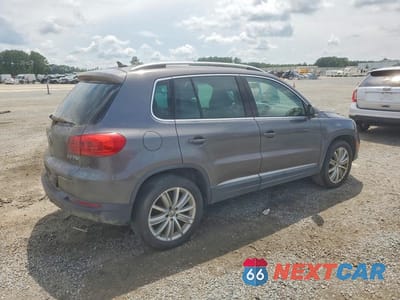 Trzecie zdjęcie samochodu z tyłu: 2012 VOLKSWAGEN TIGUAN S VIN:WVGAV7AX0CW003956 - miniatura