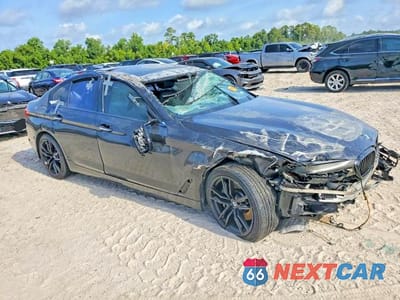 Czwarte zdjęcie samochodu z boku: 2018 BMW 530 I VIN:WBAJA5C59JWA36337 - miniatura