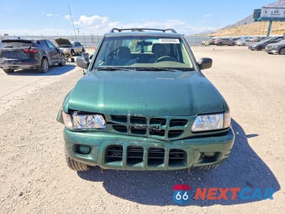 Piąte zdjęcie samochodu w środku: 2002 ISUZU RODEO S VIN:4S2DM58W924319781 - miniatura