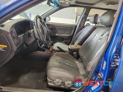 Zdjęcie 7 z 12 samochodu: 2004 HYUNDAI ELANTRA GT VIN:KMHDN56D34U127183 - miniatura