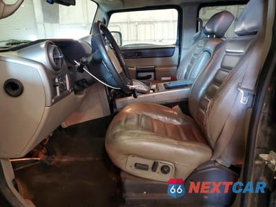 Zdjęcie 7 z 13 samochodu: 2003 HUMMER H2 VIN:5GRGN23U83H113399 - miniatura