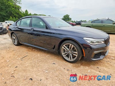 Czwarte zdjęcie samochodu z boku: 2019 BMW 750 I VIN:WBA7F0C58KGM24523 - miniatura