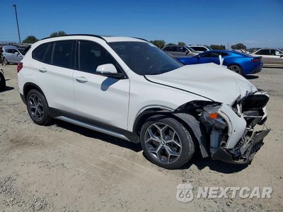 Czwarte zdjęcie samochodu z boku: 2017 BMW X1 SDRIVE28I VIN:WBXHU7C3XH5H37779 - miniatura