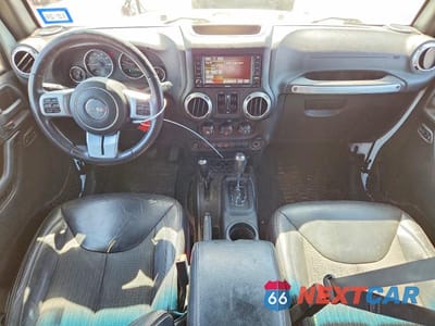 Zdjęcie 8 z 13 samochodu: 2015 JEEP WRANGLER UNLIMITED SPORT VIN:1C4BJWDG4FL568503 - miniatura