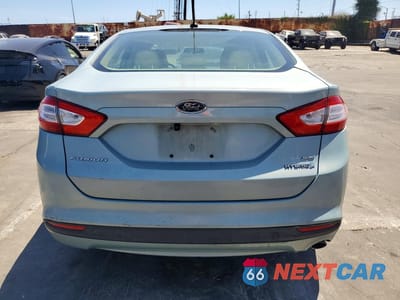 Zdjęcie 6 z 12 samochodu: 2014 FORD FUSION SE HYBRID VIN:3FA6P0LUXER179326 - miniatura